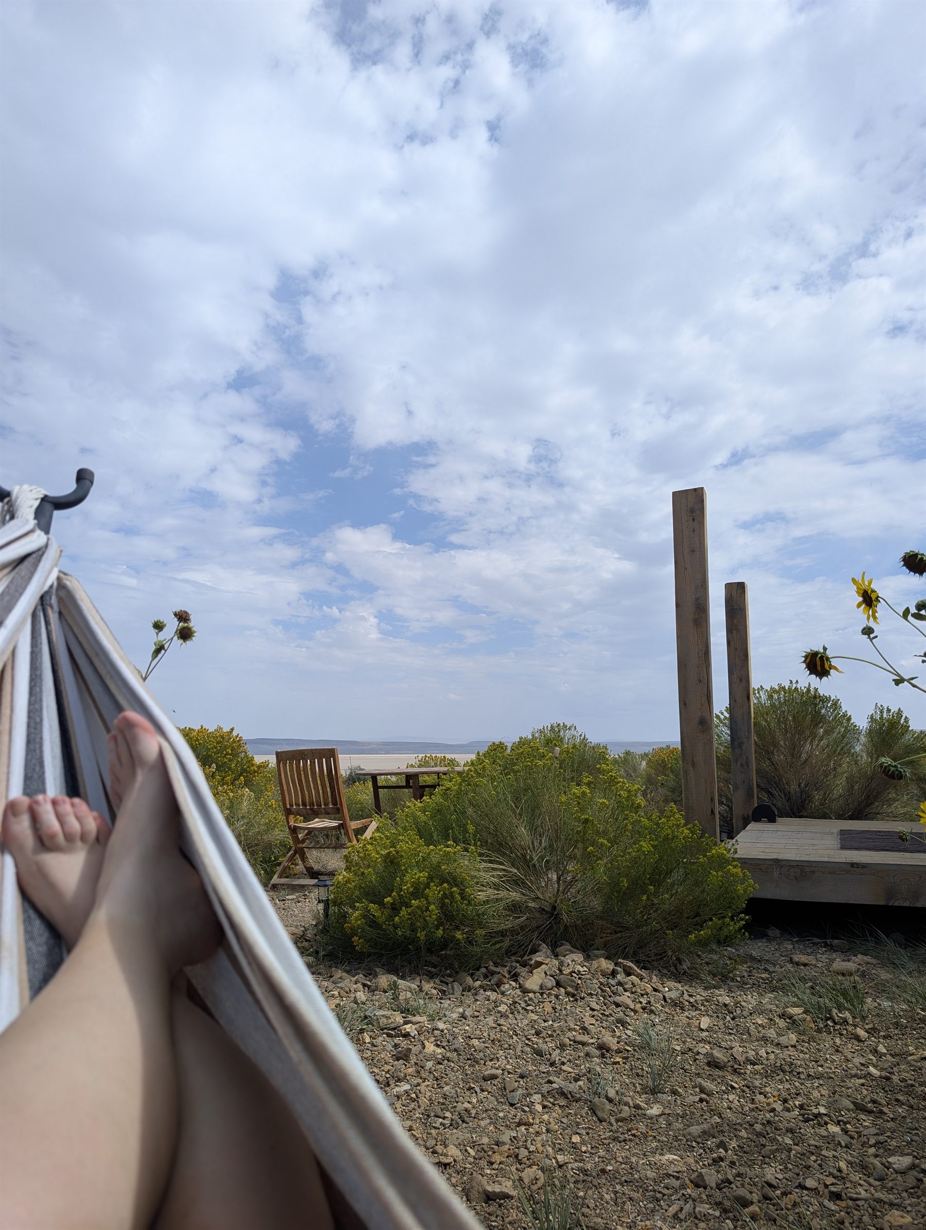 A hammock strung outside the cabin looking over the playa