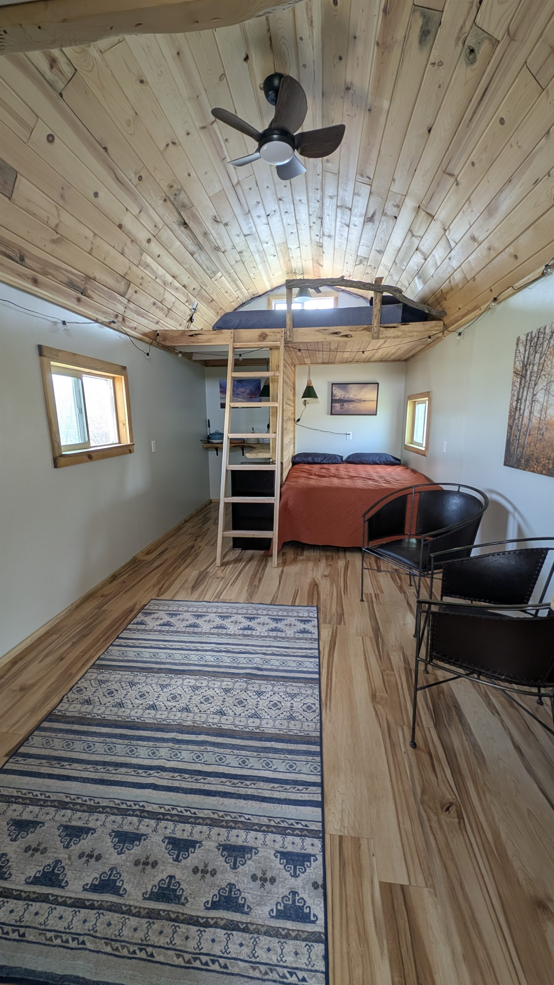 The cabin interior with the sleeping loft above